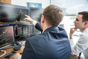 Giới đầu tư hài lòng với quyết định của Fed